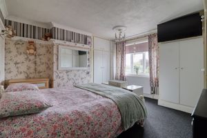 Bedroom One- click for photo gallery